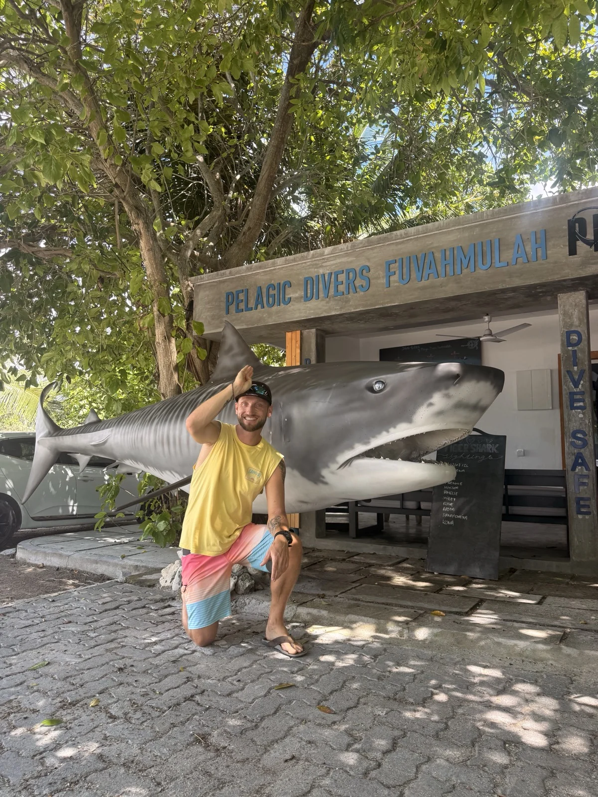At Pelagic Divers Fuvahmulah, home of tiger shark diving. | Zac Spowart at Pelagic Divers Fuvahmulah, dive with locals, shark conservation, sober travel, Nomadic Addictt.